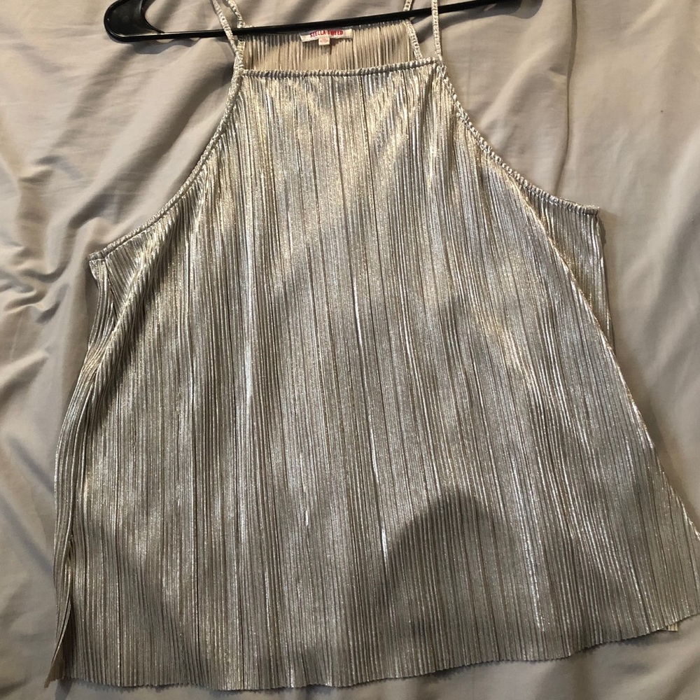 Metallic silver blouse.